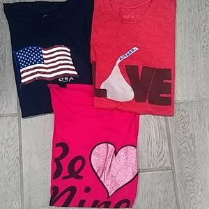 Bundle of three medium t-shirts. Word/picture